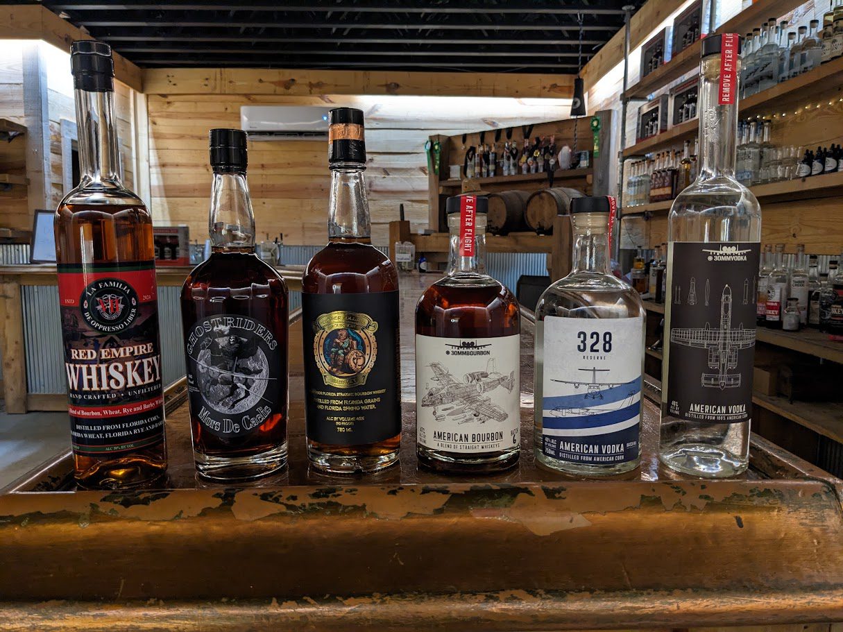 example of some our private labels. we work with a variety of different military groups for these labels. Red empire whiskey, ghostrider, copper collar bourbon, 30mm bourbon, 328 vodka, 30mm vodka
